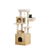 Three cats on a cream wooden cat tree with two condos and a hammock