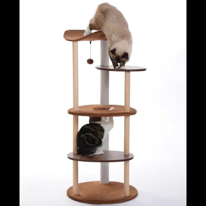 Two cats climbing and sitting on a multi-level wooden cat tree
