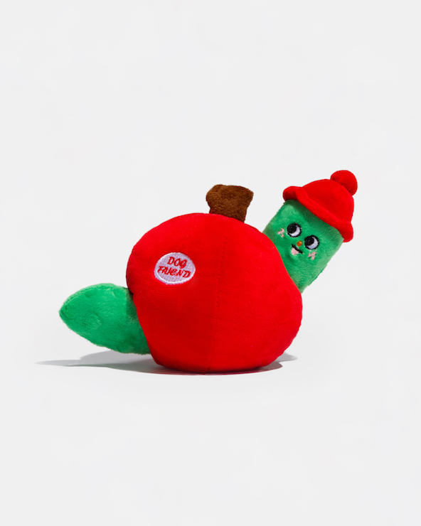 Red apple plush dog toy with green worm