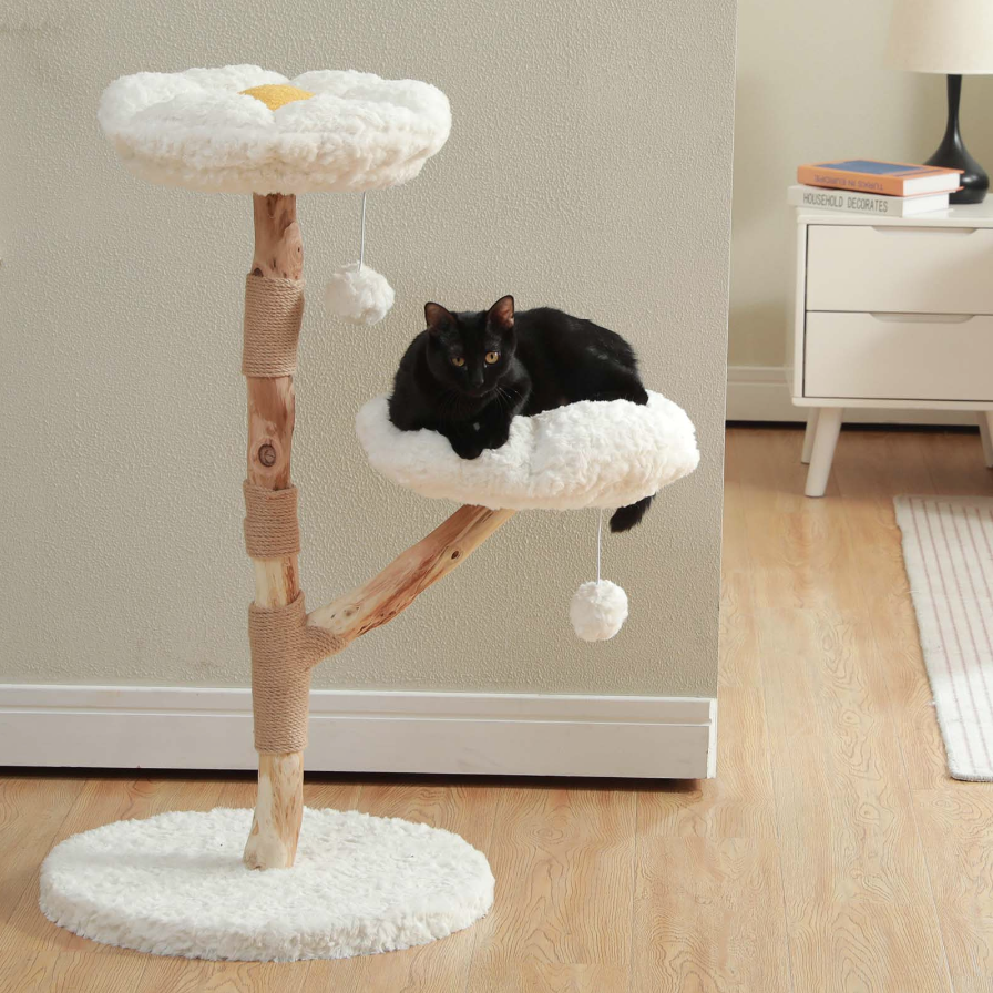 Black cat resting on the lower flower-shaped cat tree perch
