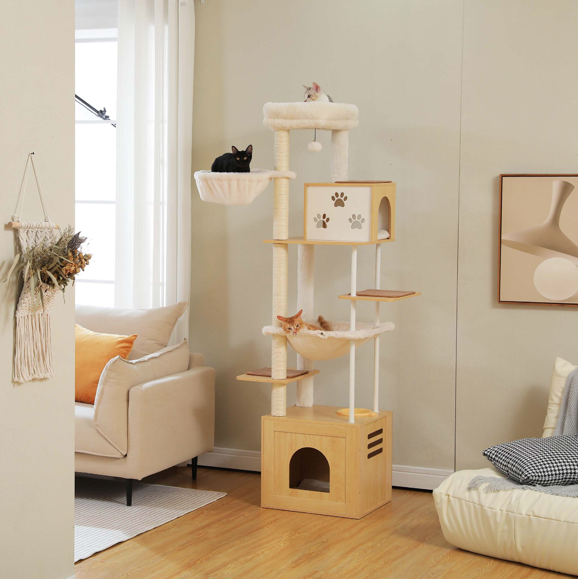 Cats on a tall wooden cat tree in a living room